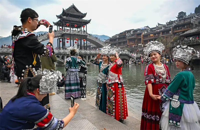 girls wearing miao dress