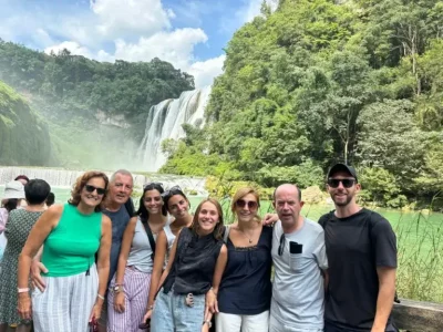 Tourists visit Huangguoshu Waterfall